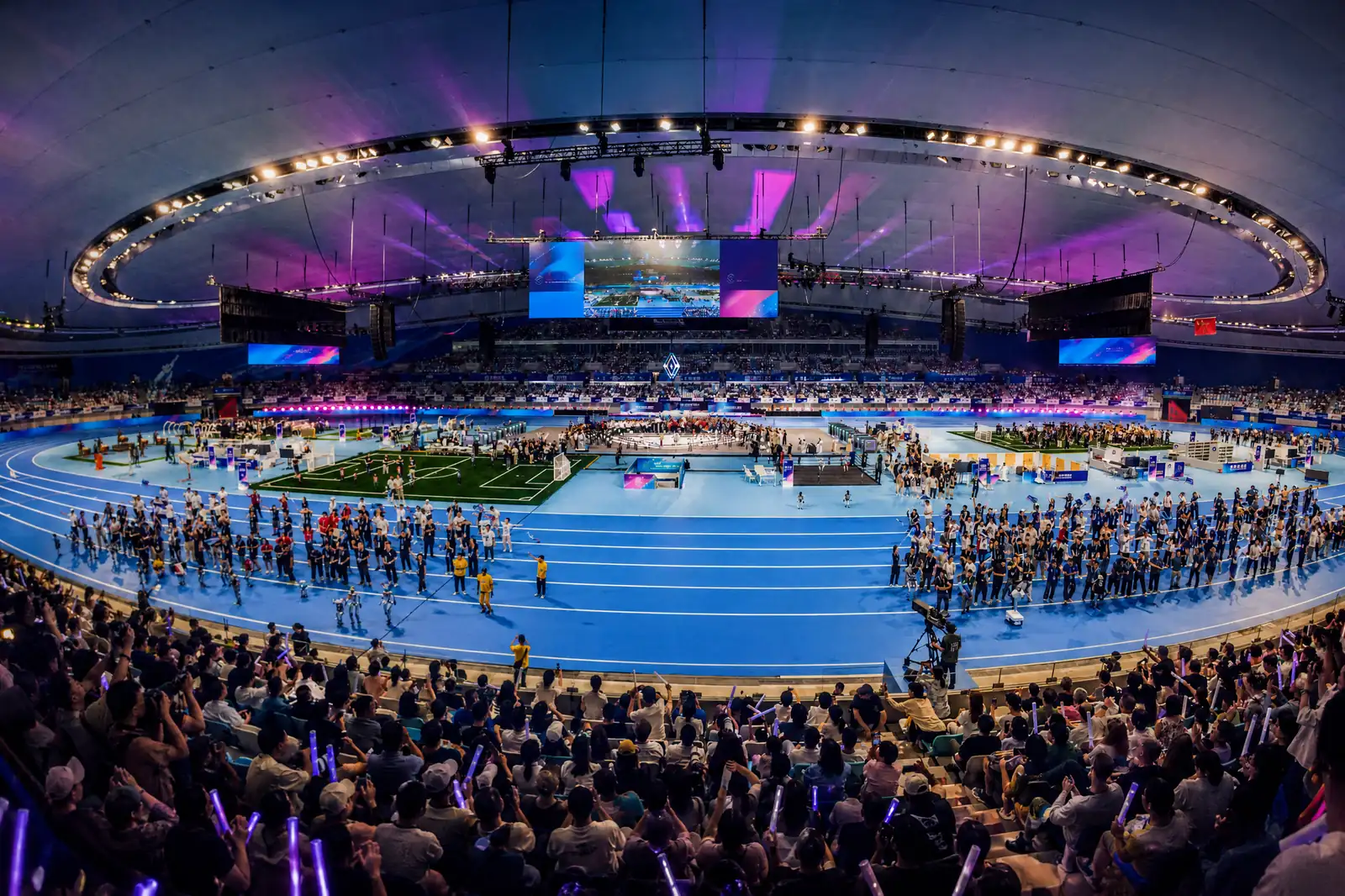 Sold-out arena during opening of the 2026 World Humanoid Robot Games, 2,056 robots contesting 51 events
